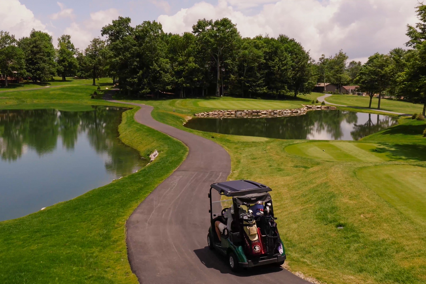 Man_in_cart_on_golf_course